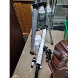 A 900 x 60 telescope on tripod stand, with extra lenses.