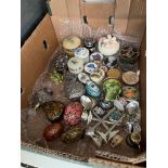 A quantity of trinket boxes, decorative eggs etc