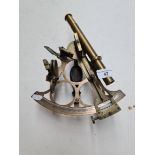 A late 19th century brass latice frame sextant, signed W.F. Cannon, London.