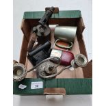 A box of assorted items to include blow lamp, flat iron, 2 small drinking flasks, plated candelabra,