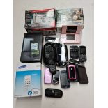 A box of mobile phones to include Samsung, HTC, Nokia, Blackberry, etc, a Trust 910Z zoom camera, an