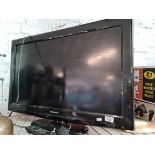 A 32" Panasonic LCD TV with remote.