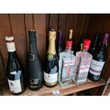 12 bottles of alcoholic beverages to include 2 bottles Beefeater gin, 1 bottle of champagne, 1