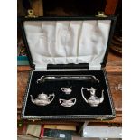 A miniature hallmarked silver tea set.