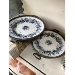 Two Victorian pottery warming plates with pewter frames