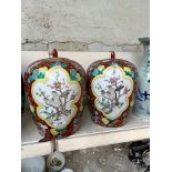 A pair ofmodern Chinese pottery vases decorated with butterflies and birds.