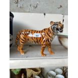 A large Beswick tiger.