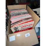 A box of 100+ Man UTD programmes, 1970s-1990s, some autographed.