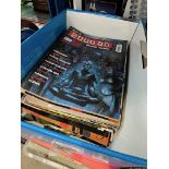 A box of 2000AD comics.