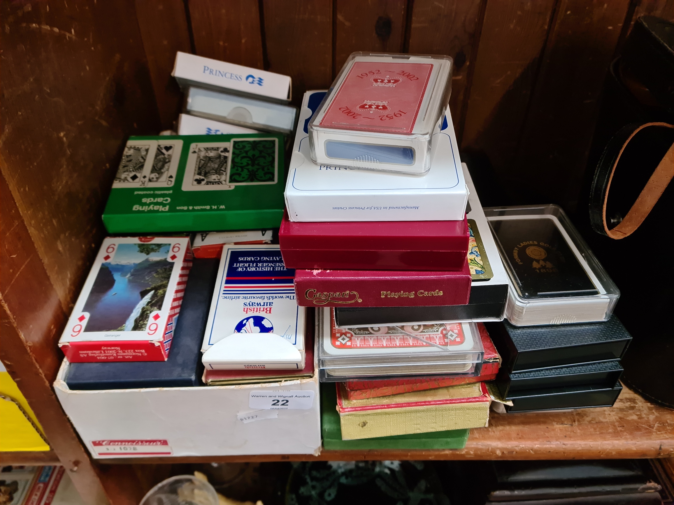 A large collection of playing cards, etc.