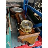 2 wooden cased barometers and a brass ship's wheel barometer.