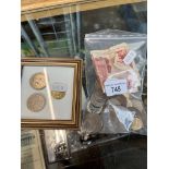 Assorted coins and bank notes.
