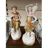 A pair of Royal Dux figurines Ht. 24cm