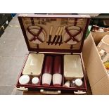 A vintage cased picnic set by Brexton including thermos flasks