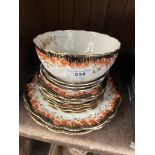 Various pieces of crown mark china; seven side plates, three saucers, two serving plates and a bowl.