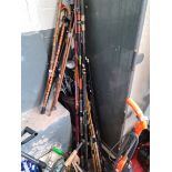 A bundle of 6 fishing rods.