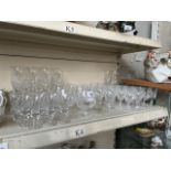 Sets of crystal glasses including flutes, brandies etc, and 2 Stuart crystal Cheltenham very large
