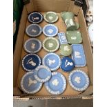 A box of various Wedgwood Jasperware including pale blue, dark blue and green