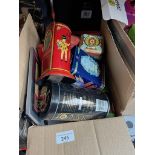 A box of old tins, money boxes, vintage soap bars, etc.