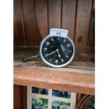 A vintage Jaeger car clock