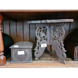 An Indian carved wood cigarette box and a small Indian carved wood table.