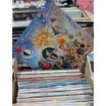 A collection of over 70 LPs from the 1980s; Fleetwood Mac, ELO, Abba, Simple Minds, Michael