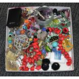 A quantity of costume jewellery including coral etc.