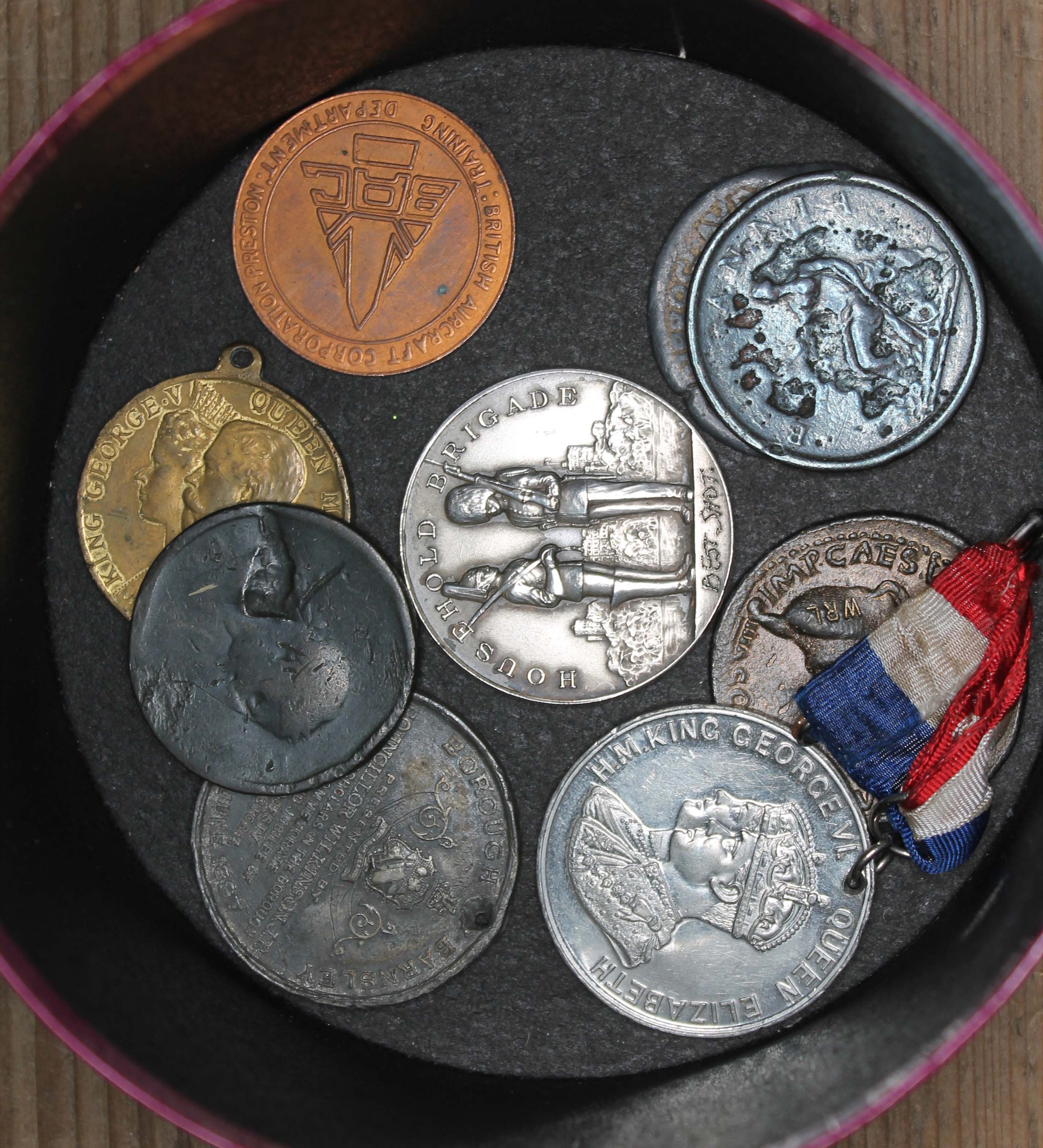 A box of various medals and coins including Coronation and Jubilee of Victoria, George V and