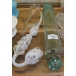 Four pieces of 19th century glass comprising a Nailsea type pipe, a twist cane, a rolling pin and