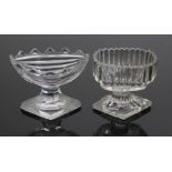 Two early 19th century glass salts, one possibly Irish with shaped bowl on lozenge foot, the other