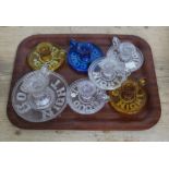 A group of seven pressed glass chamber sticks, each with 'Good Night' in relied moulding under base,
