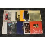 Twelve assorted jazz LPs including Miles Davis, Art Blakey, Roy Ayers, Jaco Pastorius, Freddie