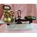 A set of Avery kitchen scales and weights.