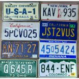 A collection of 8 US car plates to include North Carolina, Colorado, Ohio, Indiana, Alberta, New