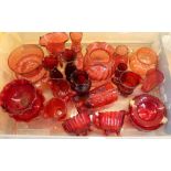 A box of assorted cranberry and ruby glass.