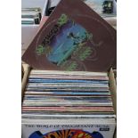 A collection of approx. 60 prog and classic rock LPs, ELP, Yes, Marillion, Genesis, Supertramp etc.