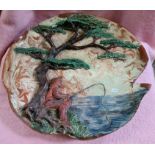 A large terracotta plaque depicting boy fishing under tree, in relief - AF