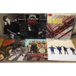 Seven The Beatles and associated LPs.