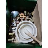 A box of assorted pharmaceutical items comprising weights, pestle and mortar etc.