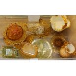 A box of mainly yellow coloured glass including a Newcastle North East Coast Exhibition 1929 pin