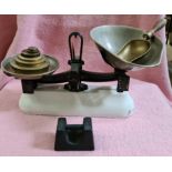 A set of Avery kitchen scales and weights.