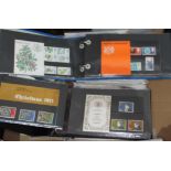 Two albums of presentation packs circa 1960s/70s, 300+ FDCs and 300+ PHQ cards circa 1960s to 1990s.