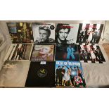 Eleven LPs including Bowie, Beatles etc.