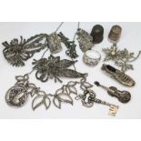Assorted silver and white metal jewellery including a key pendant, a football boot pendant,