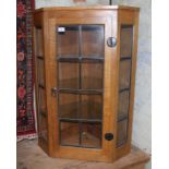 Robert 'Mouseman' Thompson of Kilburn oak and leaded glass corner cabinet with signature carved