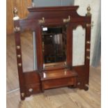 A late Victorian brass mounted wall mounting hat and coat stand with mirror and lift top