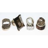 A group of seven contemporary silver rings, various marks, gross wt. 74.51g.