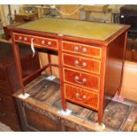 An Edwardian inlaid mahogany kneehole desk with tooled leather writing surface, boxwood and ebony