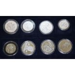 A case of eight silver proof commemorative coins.