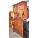 A George III mahogany chest of drawers with bookcase top, width 119cm, depth 61cm & height 219cm.